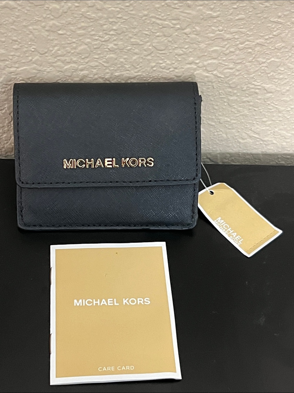 Michael Kors Black Tri-Fold Wallet with Gold Logo